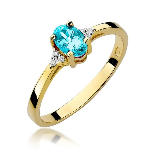 Pierścionek topaz diamenty złoto 585