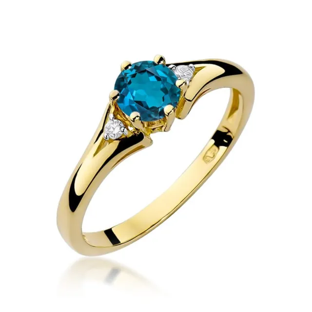 Złoty pierścionek 585 z topazem London blue 0,50ct