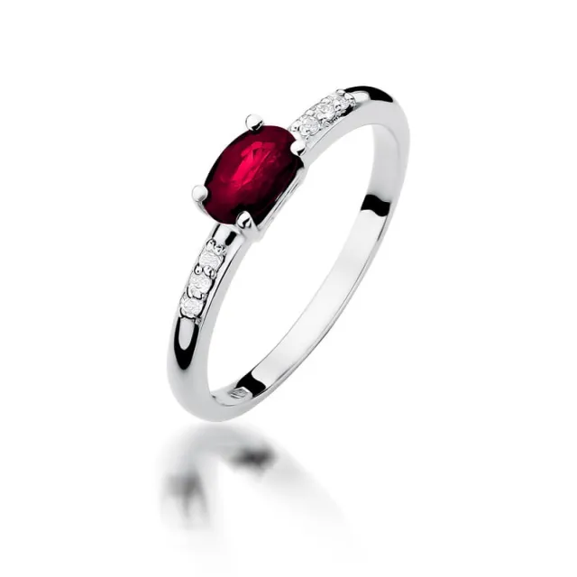 Złoty pierścionek 585 rubin 0,60ct białe złoto